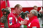 Richard Burns ja Peugeot meeskonna boss Corrado Provera.